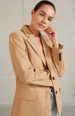 Oversized blazer with long sleeves, pockets and buttons