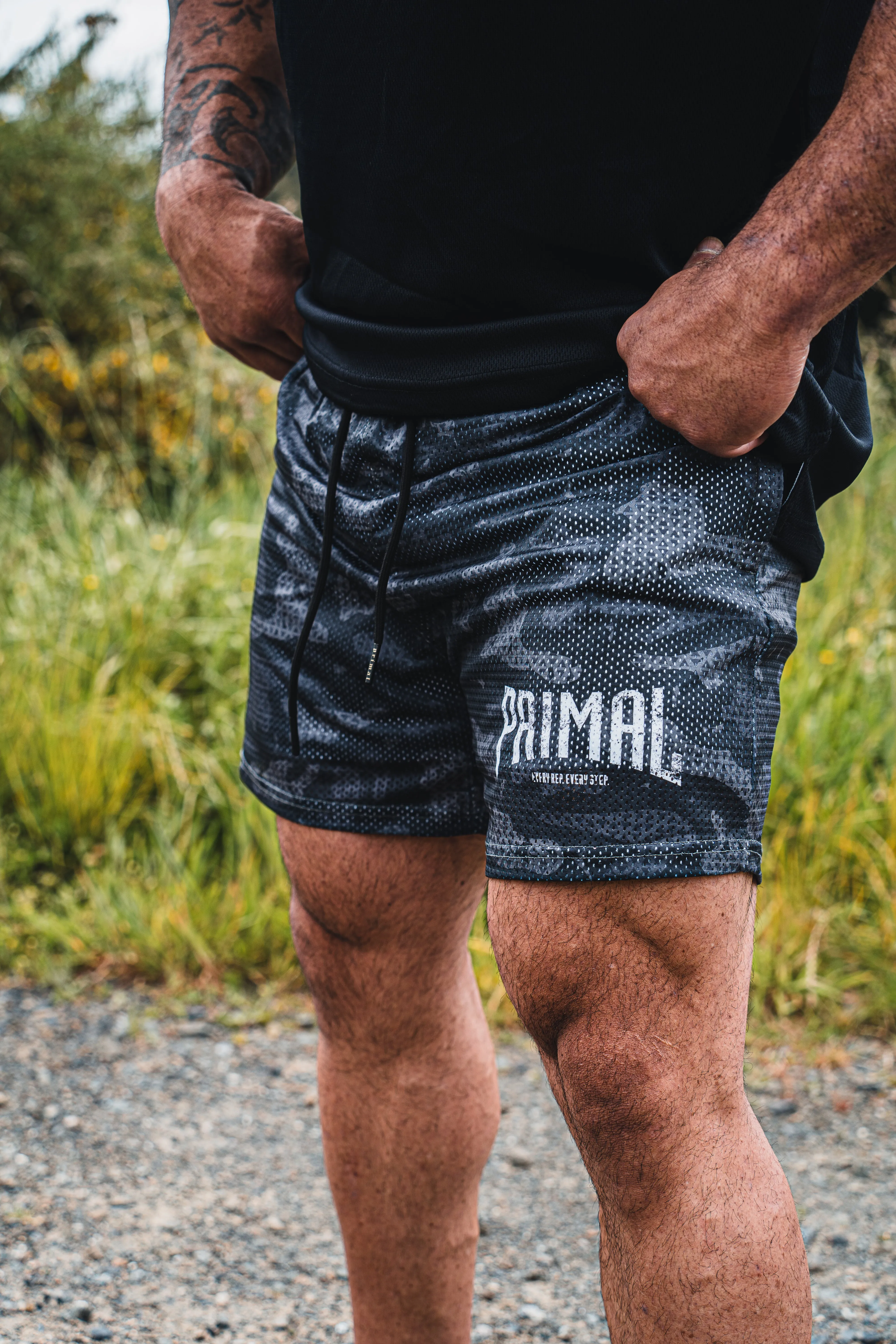 PRIMAL PERFORMANCE 2-IN-1 COMPRESSION SHORTS
